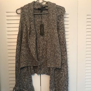 Gray knitted vest with fringe